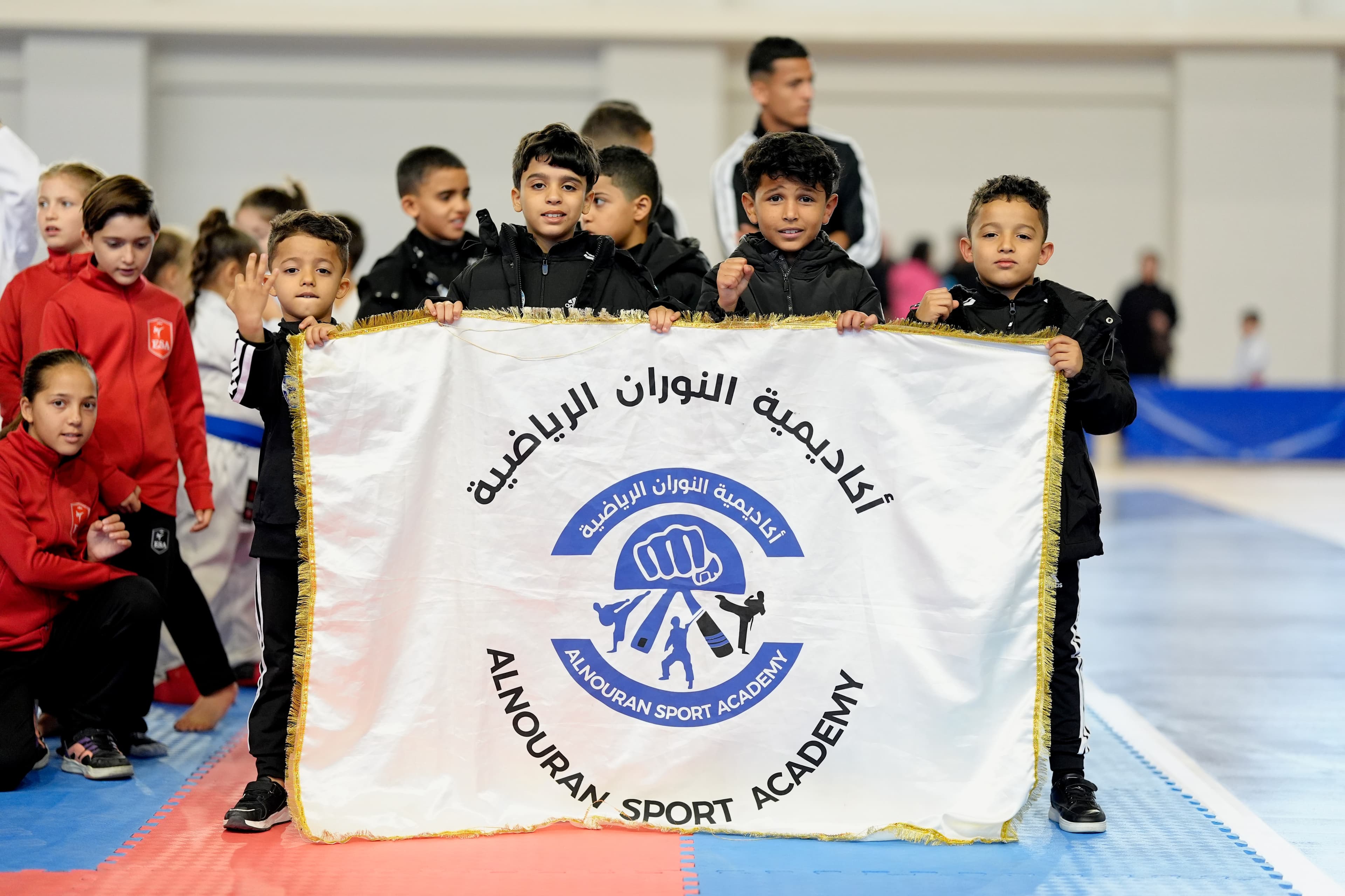 Club delegation holding their banner, Dardanelles Cup 2025
