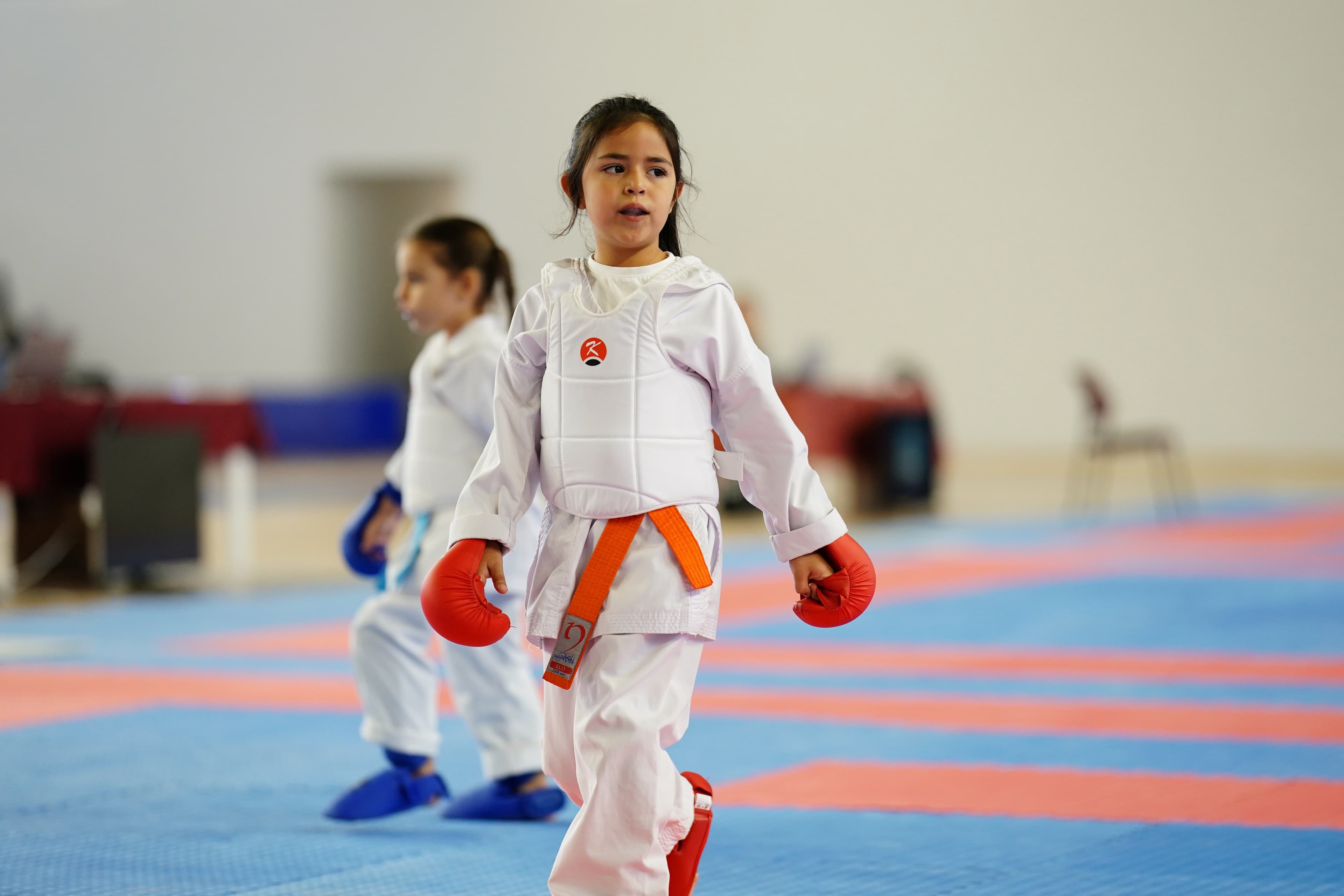 Athlete walking onto the tatami for a kumite match, Dardanelles Cup 2025